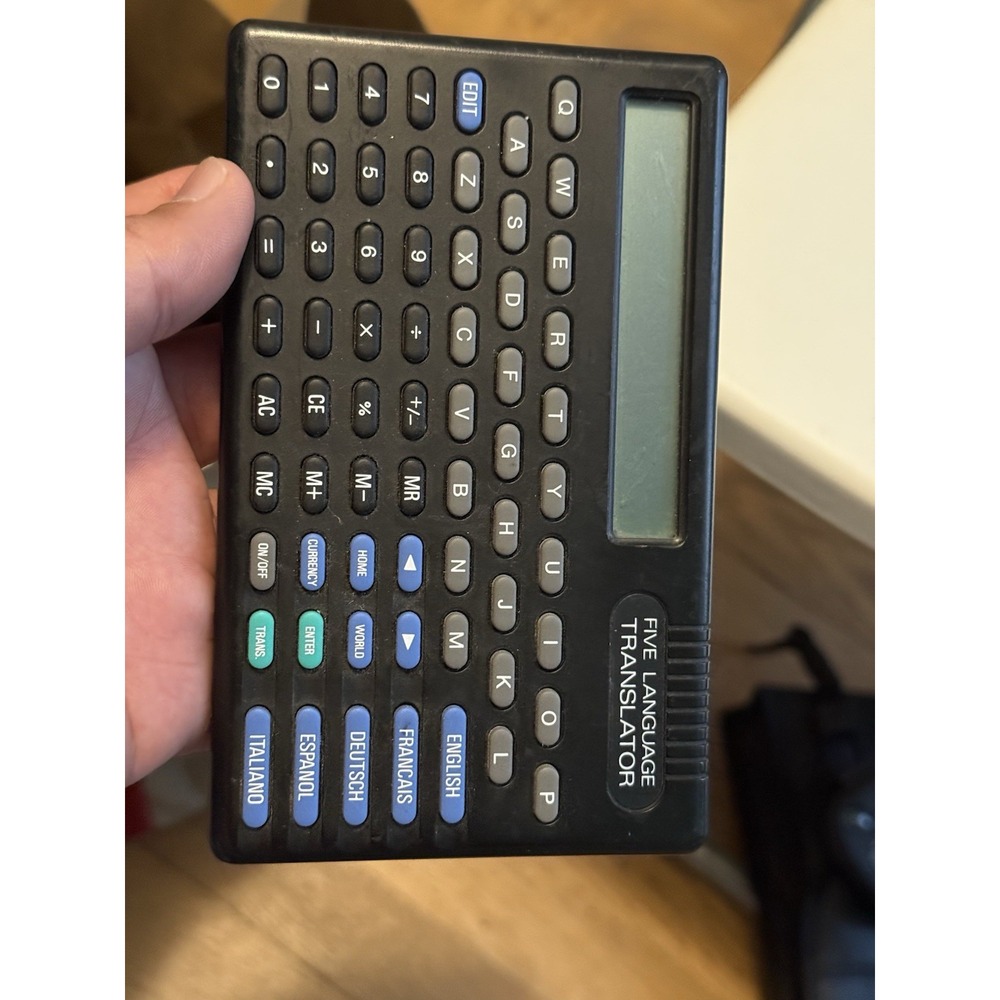 Micronta LCD Five Languages 63-683A Radio Shack and calculator, NEEDS BATTERY